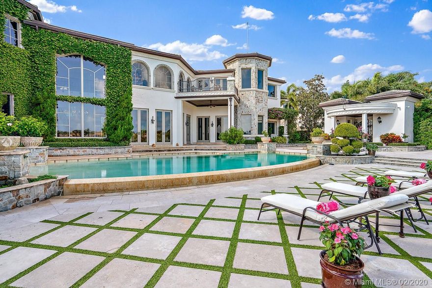 Just completed a massive update, this home is ready to accommodate a fabulous coastal style. New clean-line white contemporary finishes, blended with some traditional textures. Wide open floor plan, light, white, bright, and water views everywhere! This direct intracoastal estate sprawls on a vast and stunning piece of property and Admirals Cove amenities create the ultimate upscale resort lifestyle.