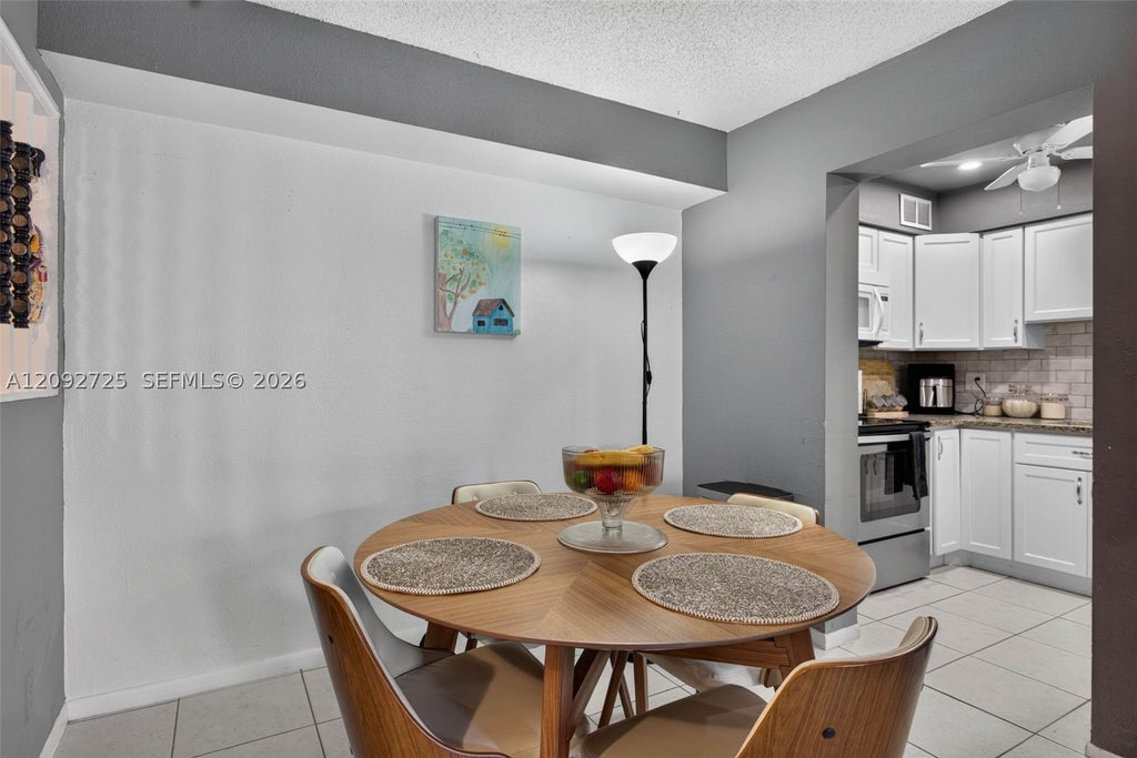 Photo of 501 SE 8th St #204, Deerfield Beach, FL 33441 (MLS # A12092725)