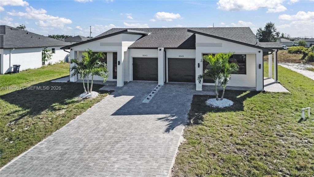 Photo of 5043/5045 Benton St, Lehigh Acres, FL 33971 (MLS # A11989611)