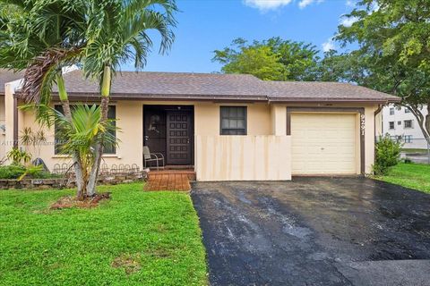 Photo of 9291 E Fern Ln, Miramar, FL 33025 (MLS # A11778649)