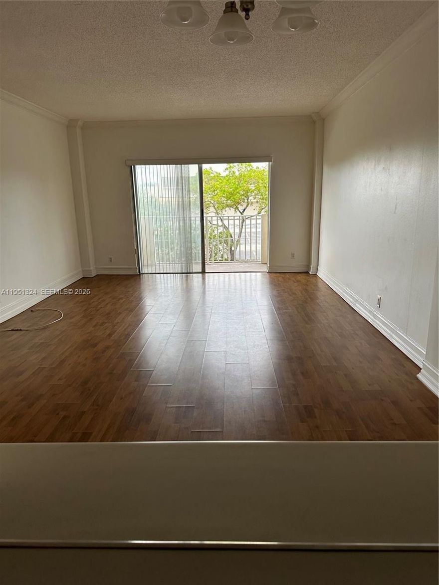 North Bay Village 1/1 by the Intracoastal, Island Place. Great building in a quiet neighborhood of upscale homes. Large bedroom with walk-in closet and linen closet, new vertical blinds, and a new tub in a tiled bathroom. Balcony with Intracoastal views off the large living/dining area with laminate floors, also in the bedroom. Full kitchen with stainless steel appliances, tile flooring, and tile at the entrance. Gym, large pool area facing the water, and BBQ area. Available now. Easy to show.