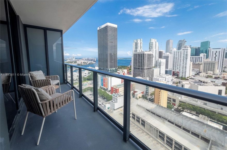 Perched on the 25th floor, this spacious 1-bedroom, 1-bath residence offers breathtaking views of Biscayne Bay from a large private balcony. Ideally located in the vibrant core of Downtown Miami, you're just steps from Miami World Center, Bayside Marketplace, the Brightline Station, and Kaseya Center. Enjoy over 65,000 SqFt of world-class amenities, including a rooftop pool with a chic lounge and bar with panoramic bay views. Stay fit in the state-of-the-art gym featuring Peloton bikes, and take advantage of additional perks like a business center, social lounge, party room, valet parking, and more. The building also features an upscale steakhouse and an exclusive speakeasy bar, offering a luxurious lifestyle with unparalleled convenience and style.