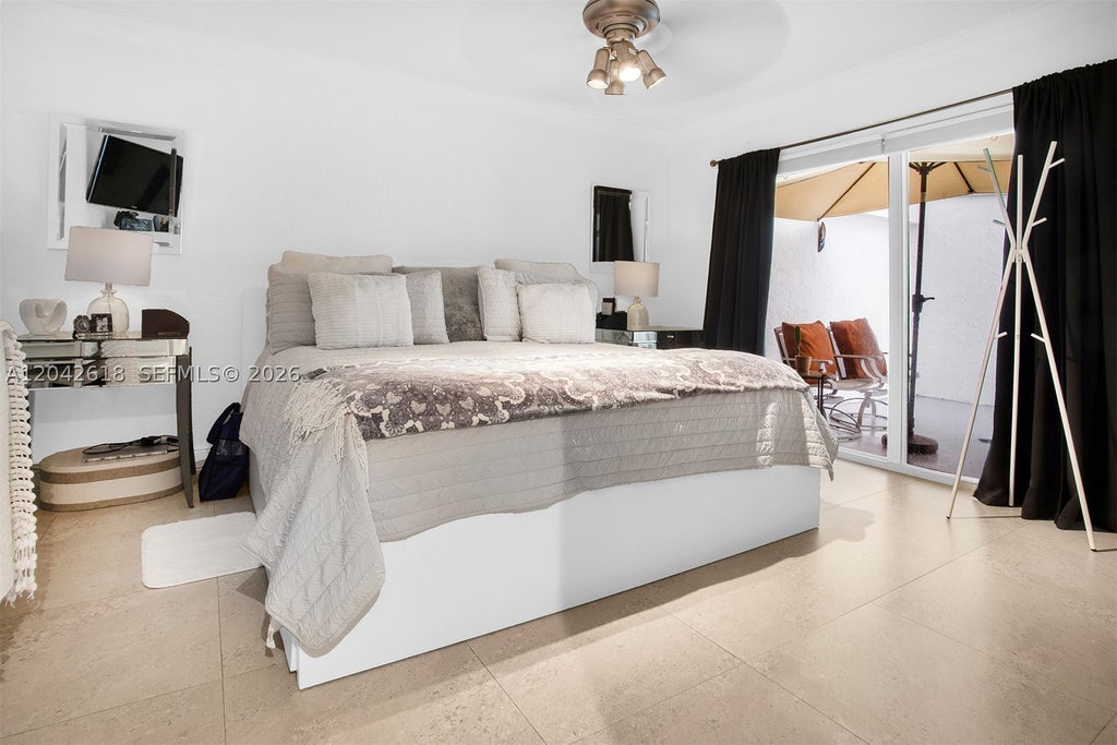 Photo of 9675 NW 26th Pl #5, Sunrise, FL 33322 (MLS # A12042618)