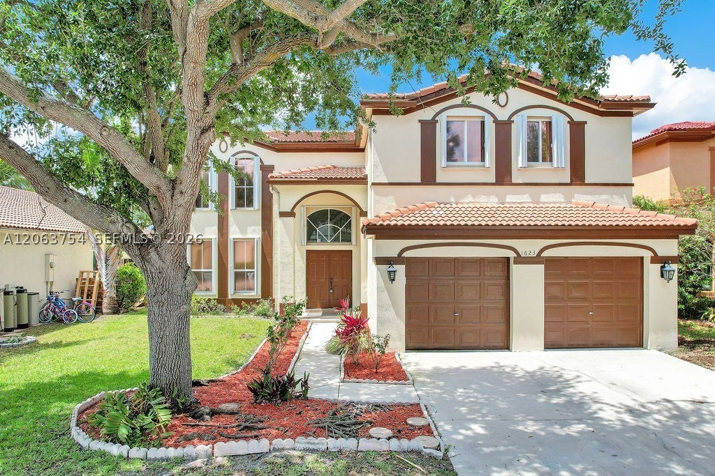 Photo of 1623 E Harmony Lake Cir, Davie, FL 33324 (MLS # A12063754)