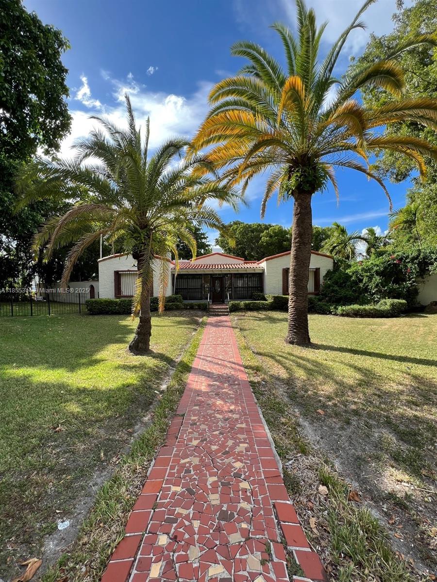 ENORMOUS OPPORTUNITY FOR THE RIGHT BUYER!! First time this assemblage of Bayshore lots is on the market in over 65 yrs. Three lots, totaling ½ an acre, on the corner of 59th St. & 5th Ave in rapidly changing BayShore. On site is a 100-year-old home spanning 5409 sf. New kitchen & appliances & bathrooms. A grand home w/ richly appointed generous rooms. Owned by a prominent Miami family for over 65 years. Presently zoned as single family residential, the property is surrounded by single & multi-family and commercially zoned lots. County has signaled willingness to relax use restrictions. Just off Biscayne, this area is undergoing dynamic changes. Property could become a stand out stunning estate home in the center of it all, or be the site of high end multi-unit residential development.
