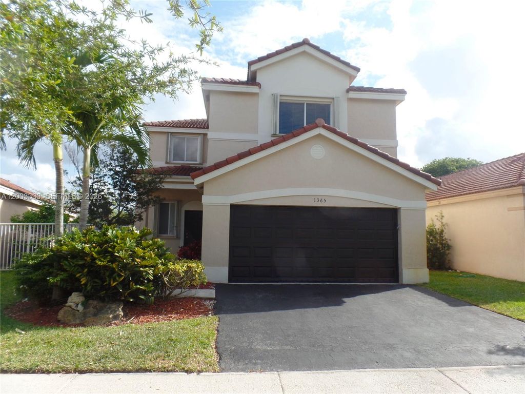 Photo of 1365 Majesty Ter #1365, Weston, FL 33327 (MLS # A12003330)