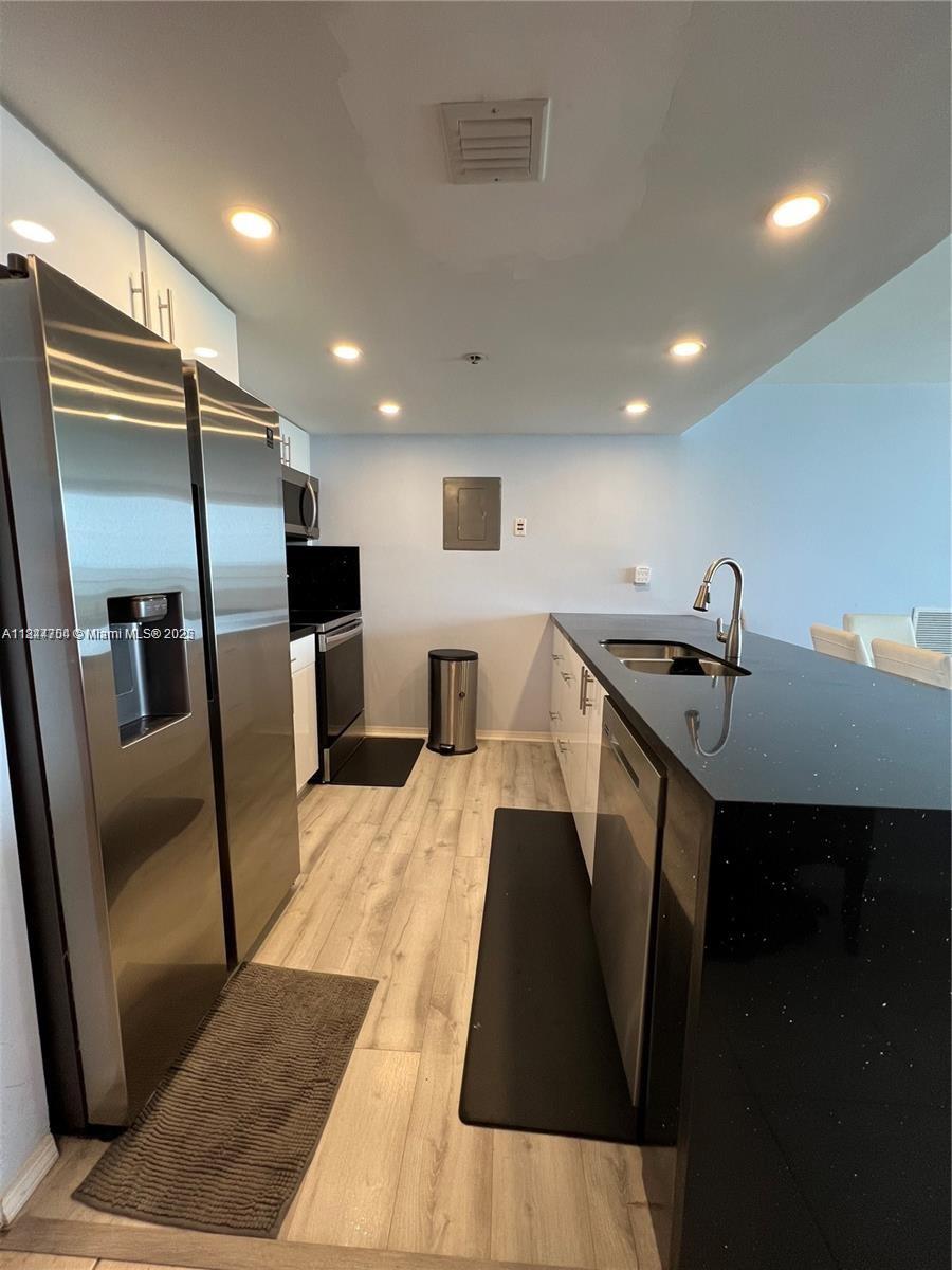 Remodeled kitchen, updated bathrooms and water view. Open concept 2/2 split floor plan. On site gym, cafeteria, mini market, beauty salon/barber on lobby level. 5 min drive to beach and 12 min drive to I95. Safe neighborhood. 24 hr security, front desk package receiving, FOB access, on site management. 500$ assoc. refundable fee per married couple or per person if unmarried. Condo assoc. will conduct criminal background check, employment verification and interview prior to move in. Offers please include: proof of income, credit check, list all persons including minors that will occupy unit. Owner/agent. Max 4 occupants.