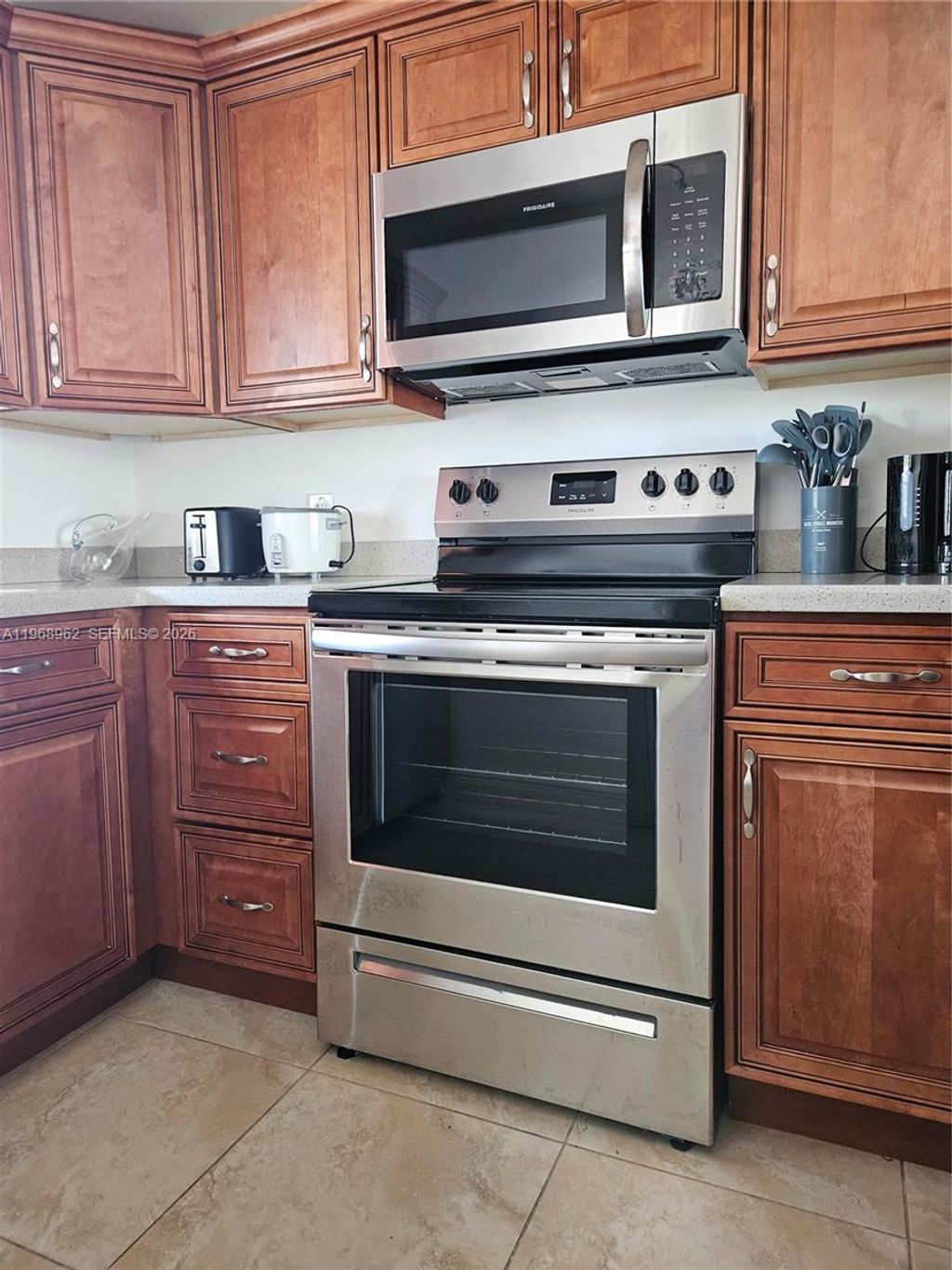 Photo of 9441 Live Oak Pl #407, Davie, FL 33324 (MLS # A11968962)