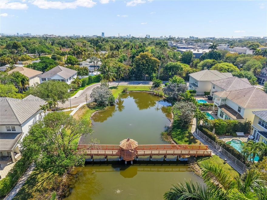 Beautiful Georgian-style home located in a gated community in Fort Lauderdale, surrounded by two serene lakes and scenic footbridges. This 3 bedroom, 3.5 bath home includes a versatile den with a closet currently being used as an office, can easily be converted into a fourth bedroom. This home features a sparkling heated pool resurfaced 2020, marble floors, a kitchen with 48” cabinets, stainless steel appliances, double oven, granite countertops with mosaic tile backsplash. The expansive primary room suite boasts two walk-in closets, dual sinks, seamless shower and jacuzzi tub. La Preserve is a gated community with only 67 homes. This property is ideally located minutes from the beach, Fort Lauderdale Airport,  major expressways, downtown Fort Lauderdale, Las Olas, dining & shopping.