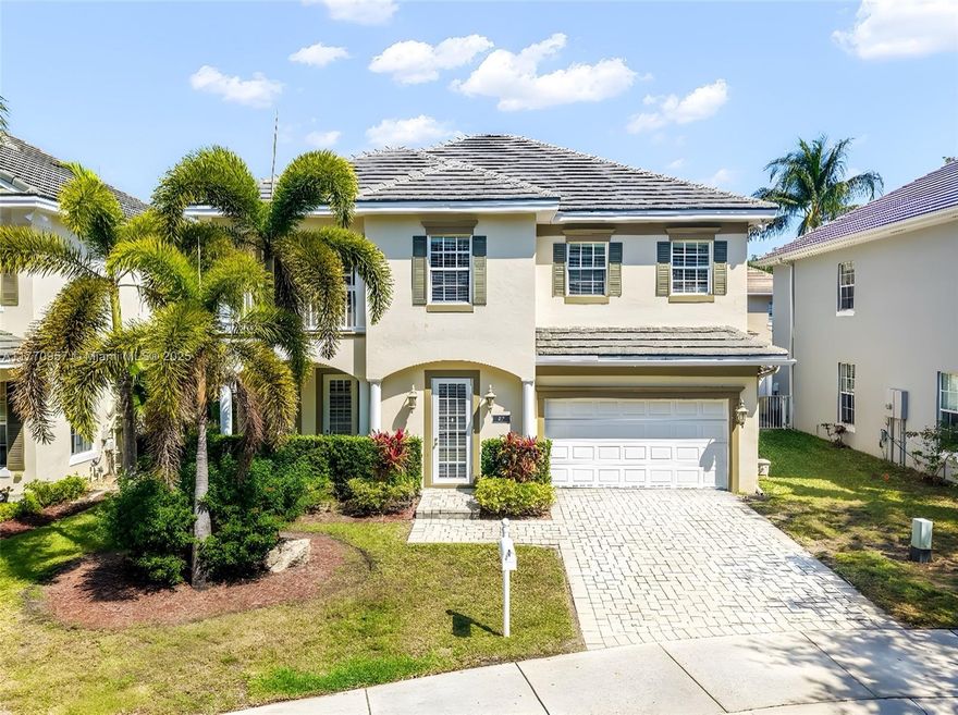 Beautiful Georgian-style home located in a gated community in Fort Lauderdale, surrounded by two serene lakes and scenic footbridges. This 3 bedroom, 3.5 bath home includes a versatile den with a closet currently being used as an office, can easily be converted into a fourth bedroom. This home features a sparkling heated pool resurfaced 2020, marble floors, a kitchen with 48” cabinets, stainless steel appliances, double oven, granite countertops with mosaic tile backsplash. The expansive primary room suite boasts two walk-in closets, dual sinks, seamless shower and jacuzzi tub. La Preserve is a gated community with only 67 homes. This property is ideally located minutes from the beach, Fort Lauderdale Airport,  major expressways, downtown Fort Lauderdale, Las Olas, dining & shopping.