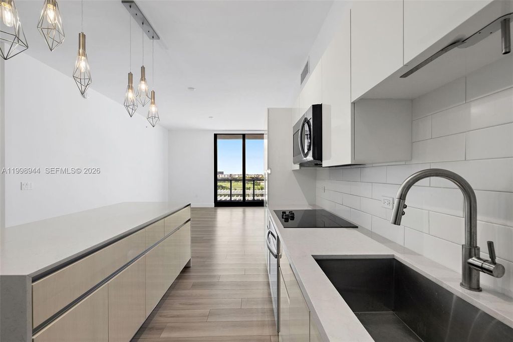 Photo of 101 Diplomat Pkwy #1409, Hallandale Beach, FL 33009 (MLS # A11998944)