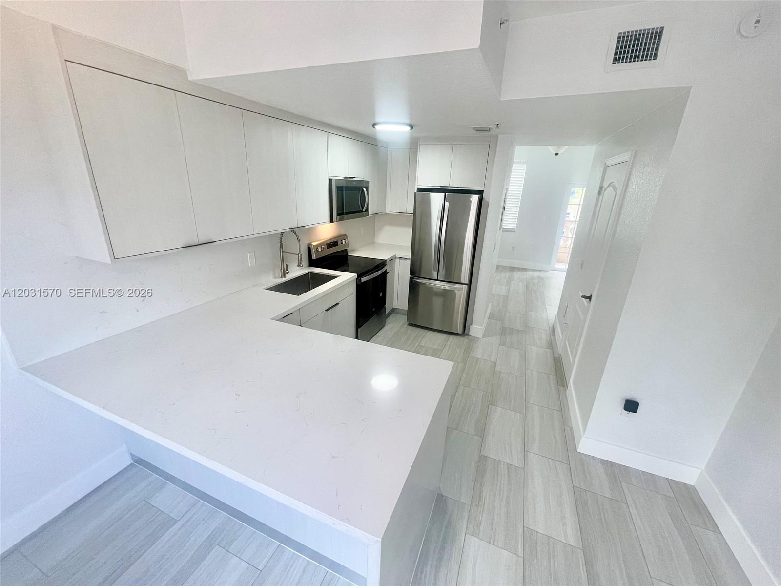 77 E 4th St A212