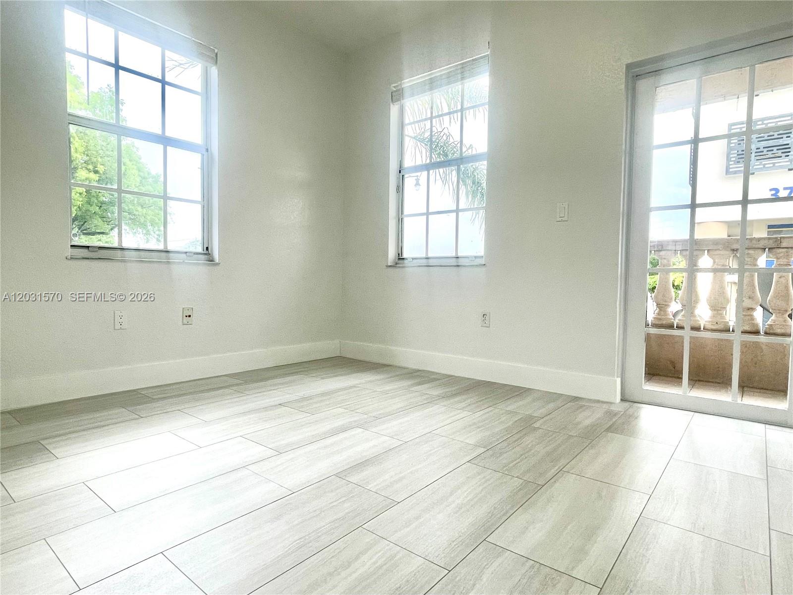 77 E 4th St A212