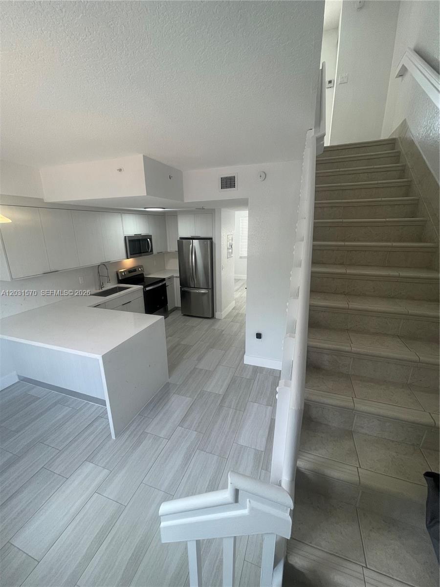 77 E 4th St A212