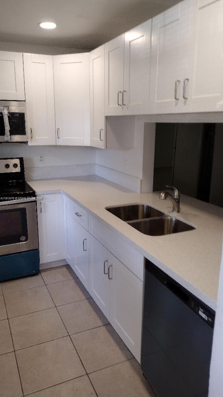 Spacious 2 bedroom, 2 1/2 bath, 2 story townhouse. It is centrally located off Ives Dairy Road on NE 12 Ave. Newly remodeled kitchen & guest bathroom downstairs. New refrigerator & dishwasher. Large living room & dining room downstairs. Two huge bedrooms upstairs. Screened balcony off master bedroom overlooking peaceful open garden area. All tile floors. Beautiful wood finished stairway. Washer & dryer are in laundry room in the patio. Two parking spots in front of unit. Walk across the street to Community Pool. Big fenced backyard for privacy. Easy access to I-95. Very close to Aventura Mall & Gulfstream shopping village. Nice and quiet community with pool. 
**Vacant. Easy to show. Please see brokers remarks below for showing instructions, No need to hit Show Assist.