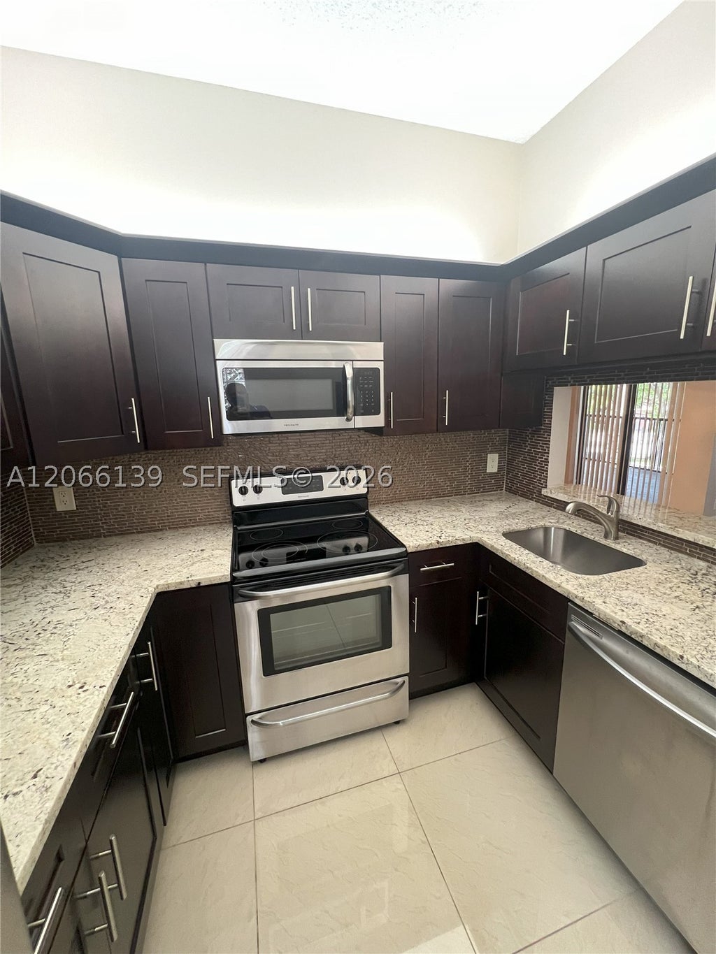 Photo of 10700 NW 14th St #142, Plantation, FL 33322 (MLS # A12066139)
