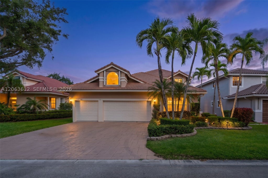 Photo of 11834 Highland Pl, Coral Springs, FL 33071 (MLS # A12063612)