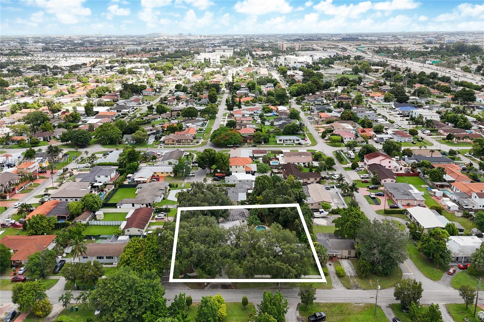 Location, location!! This property presents a unique opportunity to build your dream oasis. If that's not enough, you can build a duplex on the property for income potential or reimagine the existing home to your taste. Three opportunities & the potential is endless!! The home offers unlimited possibilities with 3,500+ adj. sq. ft. sitting on luscious oak filled corner lot w/ over half acre. Foyer entry w/ spacious open layout. Featuring 5 bedrooms, 3 bathrooms, screened terrace, eat-in kitchen & private pool. It’s located in tranquil neighborhood that's close to everything. This property offers you so much untapped potential!!