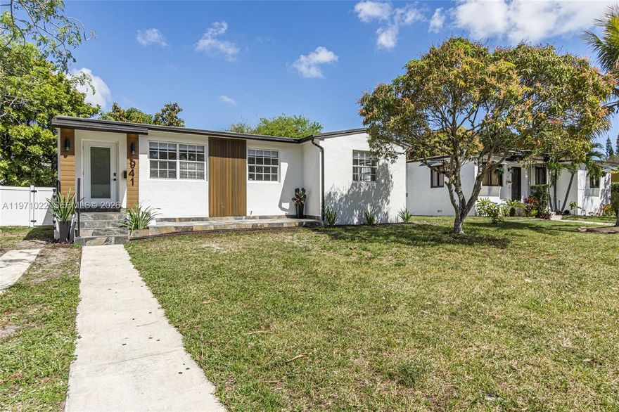 *Price Adjustment* Welcome to this impeccably updated charming 3-bedroom, 2-bath home that perfectly blends elegance, comfort, and convenience. Situated in a highly desirable neighborhood, this inviting residence offers an exceptional living experience for both families and individuals. Inside, you’ll find a bright and open floor plan with expansive living spaces—ideal for everyday living and entertaining alike. The updated kitchen features new sleek stainless steel Samsung appliances, ample cabinetry, quartz countertops, and undercounter lighting. The indoor laundry room offers space and convivence. The tranquil primary suite is a true retreat, highlighted by many windows that flood the space with natural light. It includes a spacious closets. Step outside to your private backyard oasis with mature fruit trees and beautiful deck for outdoor dining or unwinding in a serene setting. Additional highlights include a new fence (2026), FPL attic insulation (2026) for improved energy efficiency, water heater, roof (2021), AC (2017), smart switches, and contemporary LED lighting. Located just minutes from premier shopping (Aventura), dining, and beautiful beaches, this home combines peaceful living with unbeatable convenience.  Move-in ready and a must-see! Some images may be AI staged. (actual sq footage is 1,350)