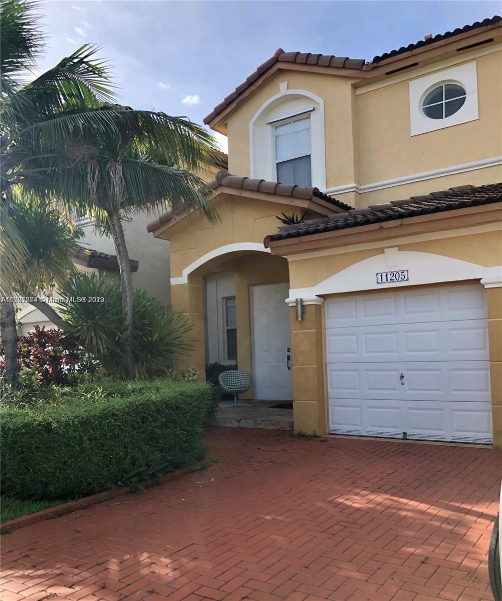 Fantastic two stories corner home in the prestigious community of Islands at Doral. This 3 Beds/2.5Baths/2 Cars Garage features a nice Kitchen w/stainless steel appliances, breakfast area and spacious family room connecting to a fenced backyard with a lake view. Tiled first floor and wood on 2nd & staircase. Excellent amenities such as clubhouse, gym, swimming pool and much more.