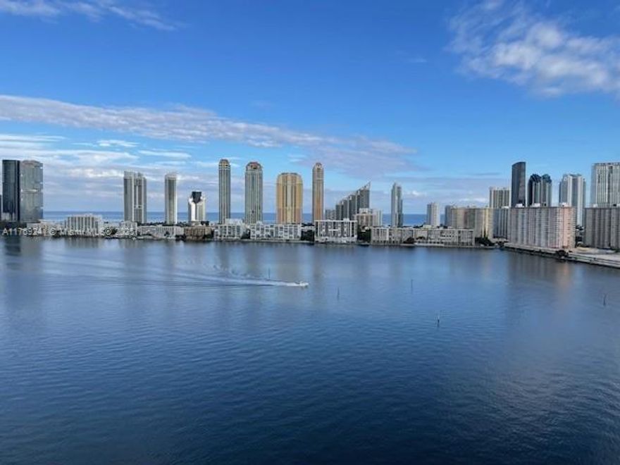 Owner relocating. Price reduced for quick sale.  Feel confident knowing that building work is done and certifications are nearly completed.  Enjoy peaceful living & captivating intracoastal & ocean views from 3 balconies & floor to ceiling windows in this Williams Island, 2665SF condo set up as a 2BR +den, 3BA unit.  This great layout features wood floors, an entry foyer, a formal living room  & dining room, an immense den convertible to a 3rd BR if desired & a large eat-in kitchen.  The oversized primary bedroom suite is your private haven. Williams Island is a premier country club community with a 27,000sf spa, fitness classes, indoor pool, tennis & pickle ball club, restaurants, children's playground, courtesy bus & marina.  Paradise in the heart of the city!