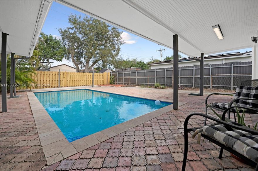 Stunning 3-bedroom 2-bathroom POOL residence in the heart of West Hollywood, offering elegance and comfort in a prime location.  The expansive backyard features a sparking pool and a generous patio, ideal for family gatherings and outdoor entertaining. The property features newer AC 2025, newer kitchen stove, newer washer and dryer, new updated electrical panel with permit 2025, updated bathrooms, freshly painted.  Property is located to Publix, Winn Dixie, move in ready