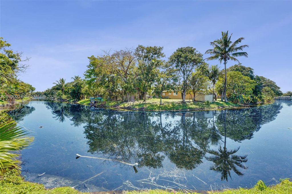 Photo of 4460 NW 43rd St, Lauderdale Lakes, FL 33319 (MLS # A11990034)