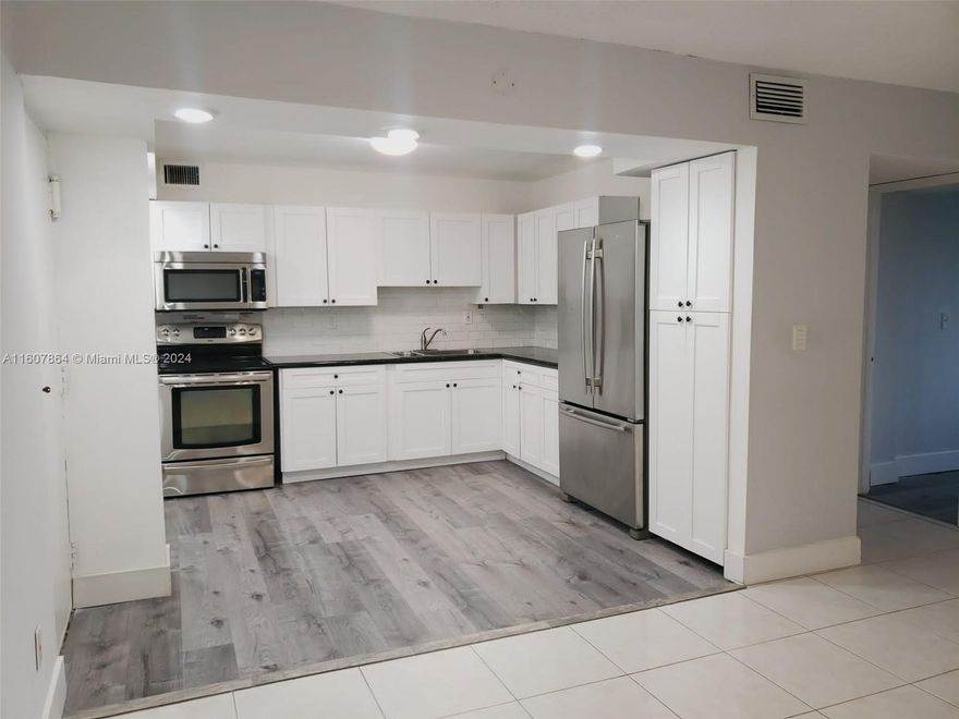Remodeled 3 bed 2 bath unit in The Sovereigns Condo. Located on the 3rd floor. The kitchen has been upgraded with PVC floors, white wood cabinets and stainless steel appliances. Master bedroom has an en-suite bathroom and plenty of storage space. This unit is very spacious and has a large living space. Screened balcony. Unit comes with accordion shutters. Water is included. 2 assigned parking spaces. Guest parking is available. Enjoy two pools, maintained community, management on-site. Laundry facilities. Pets not allowed. $500 security deposit to Association.