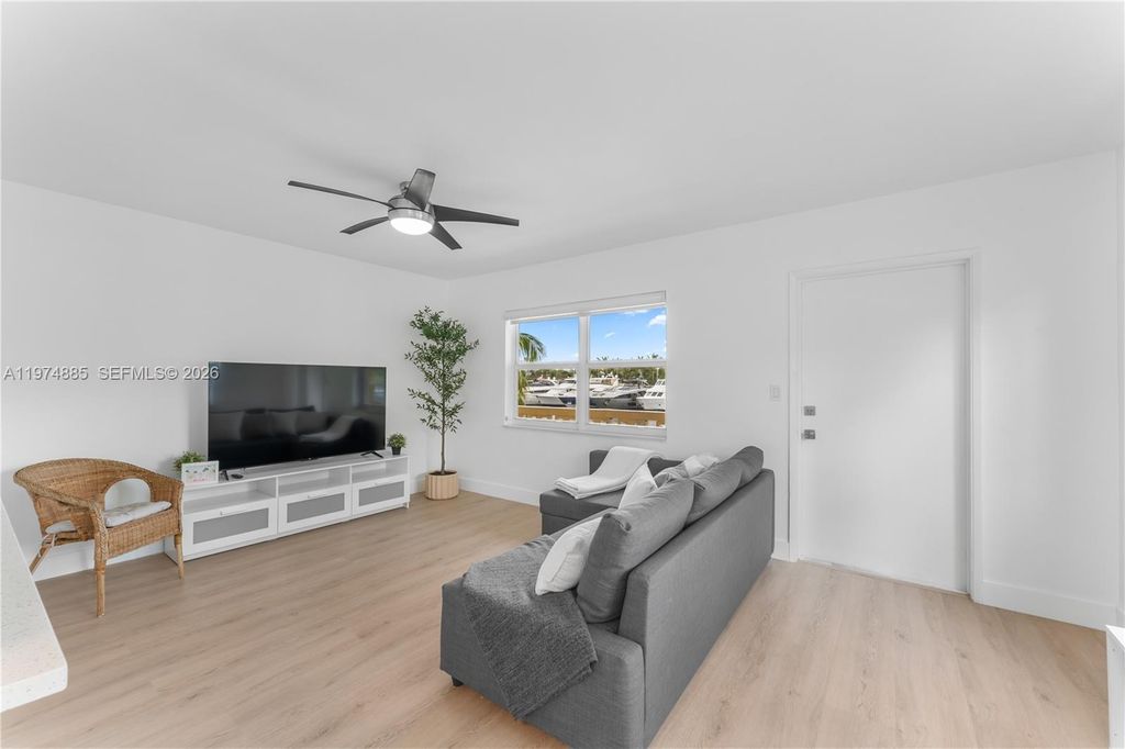 Photo of 815 Middle River Dr #218, Fort Lauderdale, FL 33304 (MLS # A11974885)