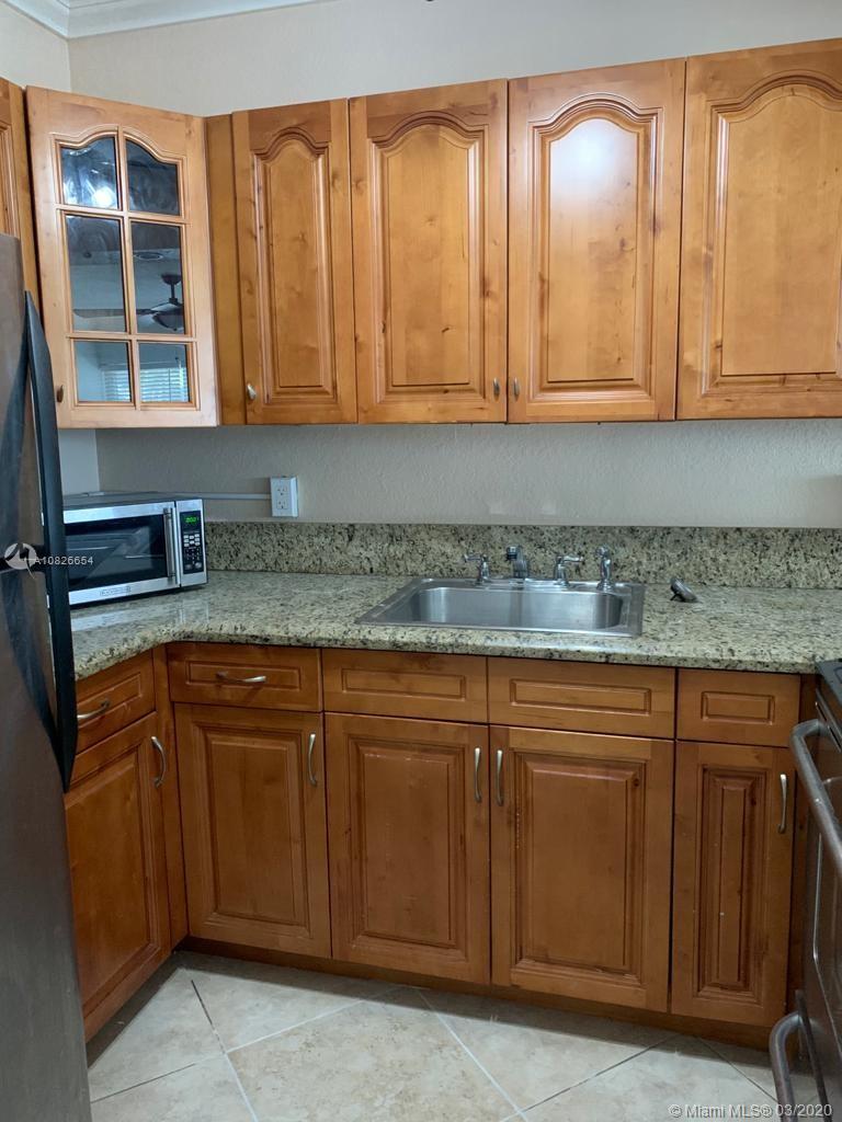 Gorgeous 1 bedroom unit in gated community, minutes from Gulfstream Park, shops and restaurants. Remodeled kitchen, tiled throughout, lots of light, impact windows & doors and one assigned parking spot. Building offers social room, laundry facilities and heated pool.