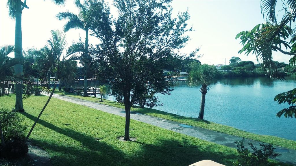 Photo of 960 Crystal Lake Dr #214, Pompano Beach, FL 33064 (MLS # A11851004)