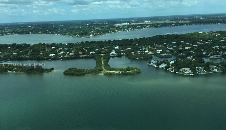 Rare opportunity to own BAY TREE ISLAND located on the southern peninsula, within the coastal Town of Sewall’s Point. List price is for lots 148 and 150, lot value only.  Stunning Intracoastal and lagoon views with easy access to the St. Lucie Inlet from your private dock on protected water.  This T-shaped waterfront property offers nearly 5 acres of land, 3200’ of water frontage, and approximately 8 acres submerged land. The Island creates a unique opportunity to build your dream home and guest house to enjoy year-round fun in the sun.  White sandy beaches surround the Island, perfect for launching kayaks and paddle boards, or to enjoy the abundant wildlife and beautiful sunrises and sunsets. Nearby STUART offers great restaurants, shopping, & nightlife.  MC has excellent public schools.