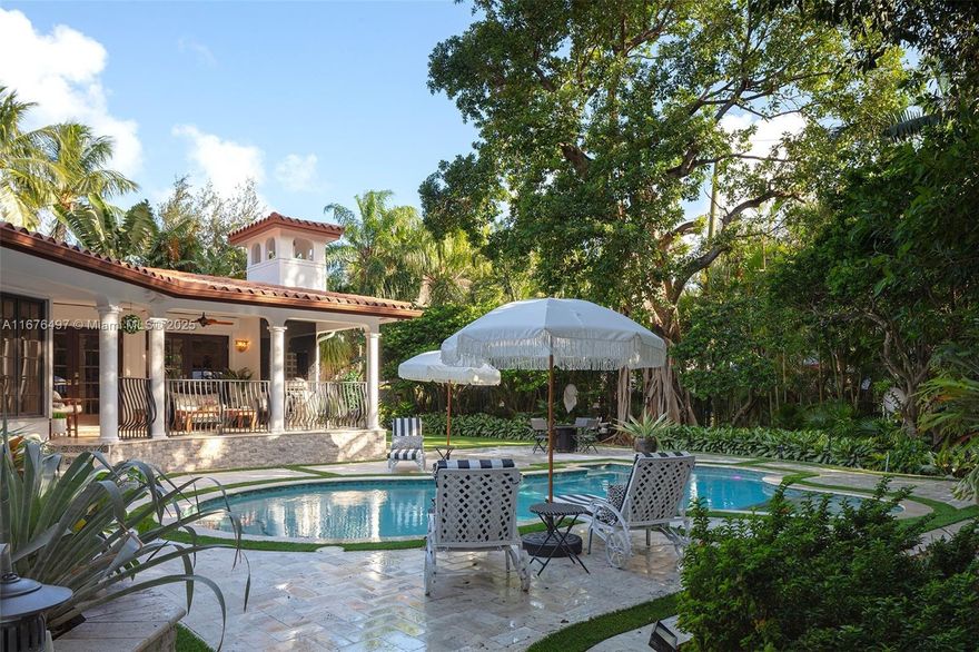 Welcome to your Spanish Colonial dream home in Idlewyld, one of the most prestigious gated communities in East Ft. Lauderdale. This stunningly renovated tri-level, 3-bedroom, 3.5-bath residence set on a walled-in double lot of 15,000 sqft offers an exquisite outdoor oasis with a serene saltwater pool, covered loggia, BBQ area, and lush tropical landscaping for complete privacy. Professionally designed & decorated, it features a living area with fireplace, wine room, and French doors. The family room has high-beamed ceilings & authentic light fixtures, the gourmet kitchen boasts top-tier appliances and a breakfast nook with pool views. Primary suite includes a spa-like bath, sitting area, & private balcony. Wood flooring throughout, generator, EV charger & a remote gate for added security.