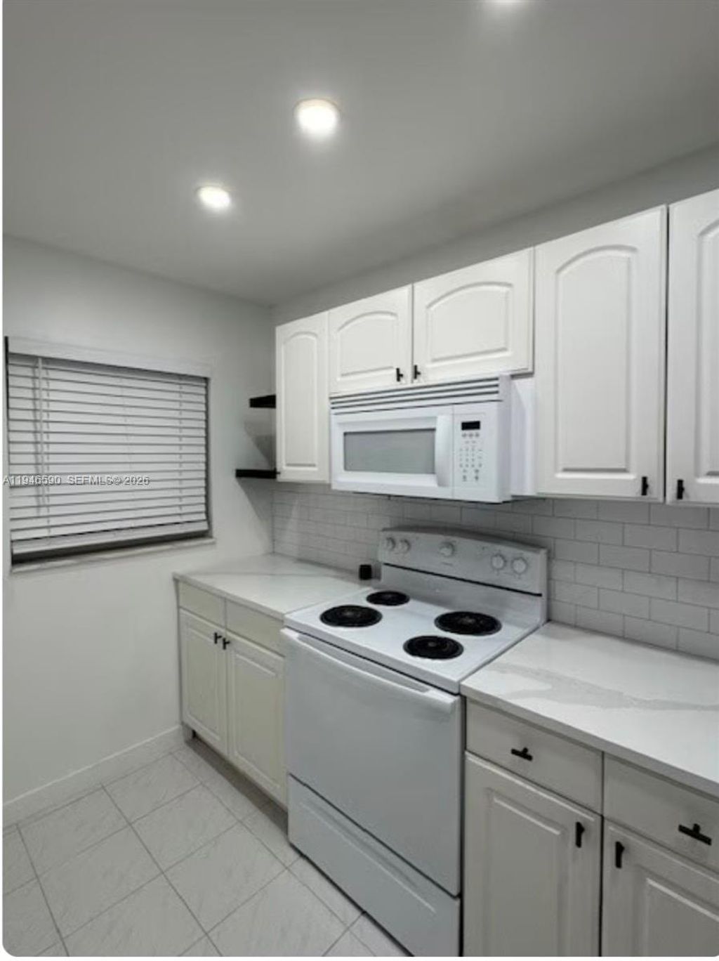 Photo of 9460 Poinciana Pl #405, Davie, FL 33324 (MLS # A11946590)