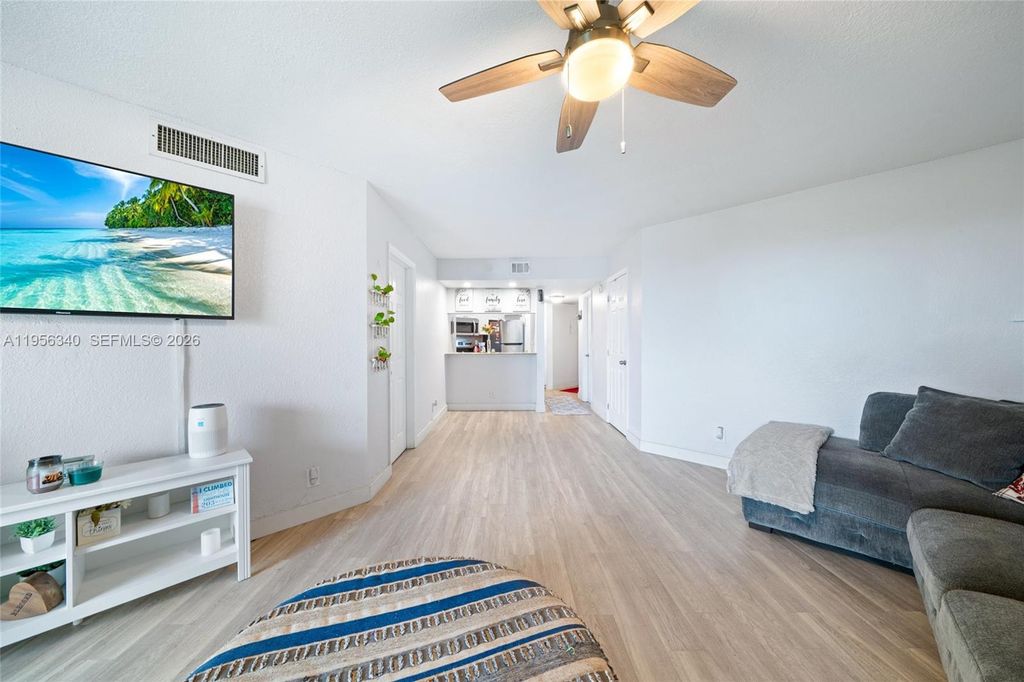 Photo of 10551 W Broward Blvd #408, Plantation, FL 33324 (MLS # A11956340)