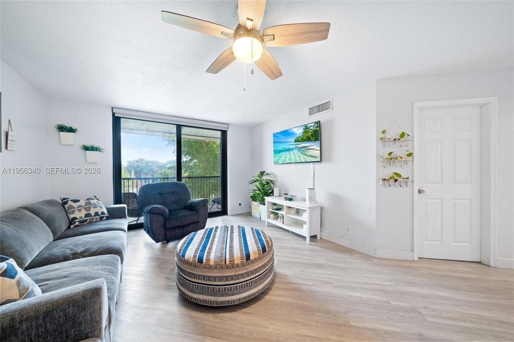 Photo of 10551 W Broward Blvd #408, Plantation, FL 33324 (MLS # A11956340)