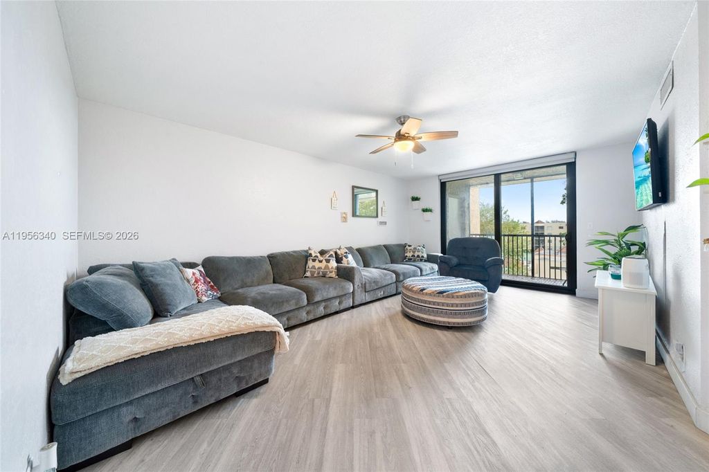 Photo of 10551 W Broward Blvd #408, Plantation, FL 33324 (MLS # A11956340)