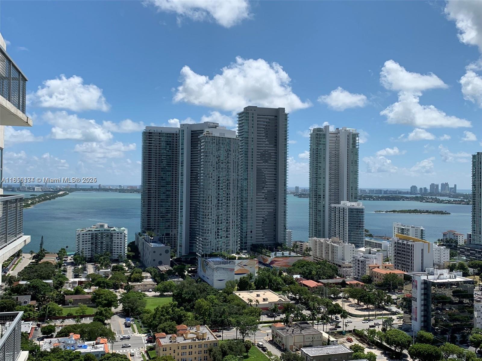 Bright, unfurnished & the largest 1/1.5 layout in Midtown 4. Enjoy lovely Biscayne Bay, pool deck & city views from the 29th floor. High ceilings, impact windows, stainless steel appliances, granite countertops & more. Some of Midtown 4's amenities include: 24 hour security, rooftop pool, jacuzzi, fitness center, game room & yoga room. Walk to restaurants, shopping & nightlife. Unbeatable location blocks from Wynwood, Design District & major highways. Please use showing assist.