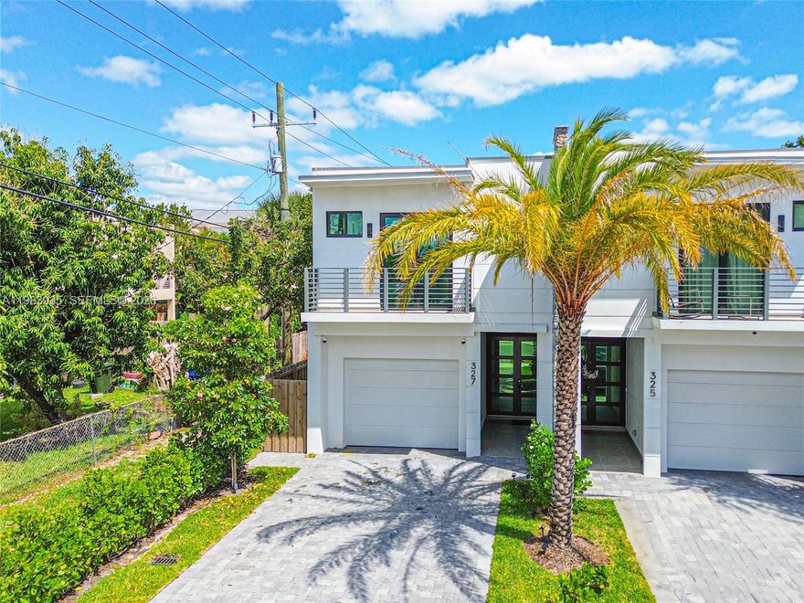 Discover modern elegance in this new Fort Lauderdale townhouse. Featuring 4 generous bedrooms and 4 sophisticated bathrooms, each with premium designer touches. The state-of-the-art kitchen, complete with high-end appliances, is a chef’s dream. Unwind by the sparkling saltwater, heated pool or host gatherings at the stylish outdoor kitchen. A sleek wet bar elevates the vibe, while the garage, with its polished epoxy floor and electric vehicle charger, adds convenience. Perfectly positioned near Las Olas Blvd, downtown, pristine beaches, and the airport, this home balances vibrant city access with serene coastal charm. Fully staged with a stunning summer kitchen for outdoor enjoyment. Property is rented until March 31st