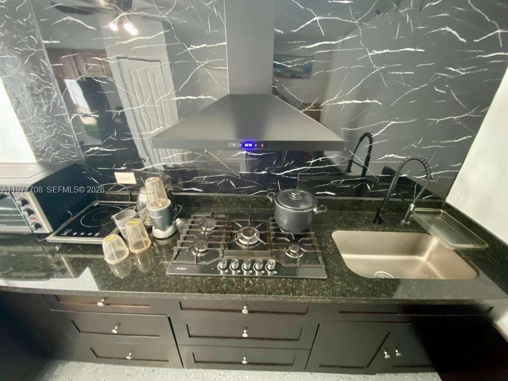 Photo of 7110 Hope St, Hollywood, FL 33024 (MLS # A11977708)