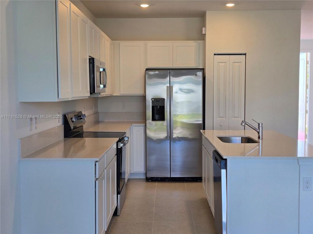 Photo of 525 SE Rivergrass St, Port Saint Lucie, FL 34984 (MLS # A11791528)