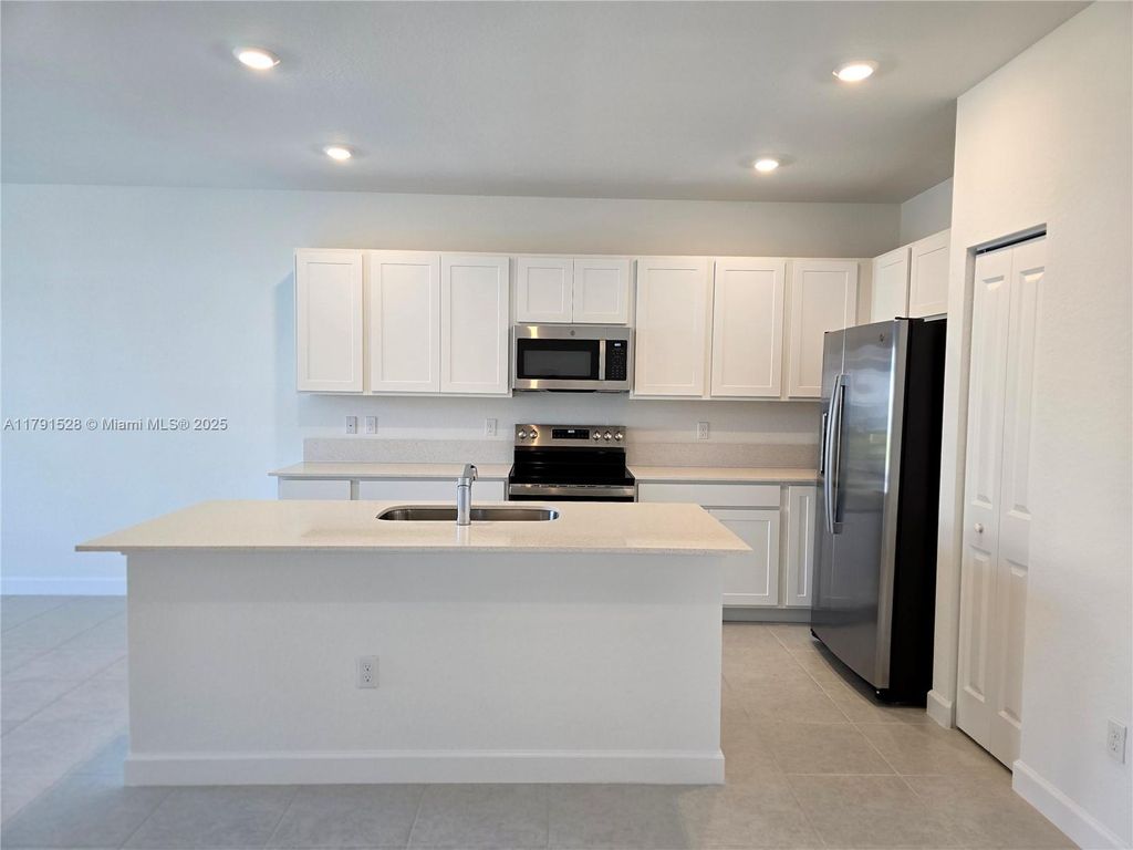 Photo of 525 SE Rivergrass St, Port Saint Lucie, FL 34984 (MLS # A11791528)