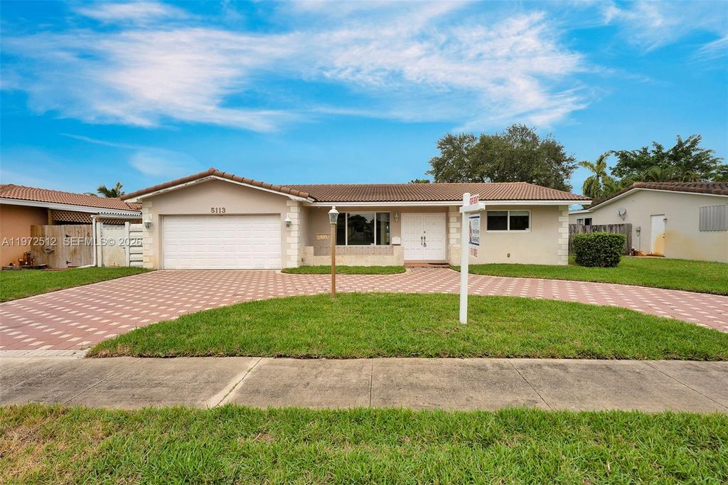 Photo of 5113 Mckinley St, Hollywood, FL 33021 (MLS # A11972512)