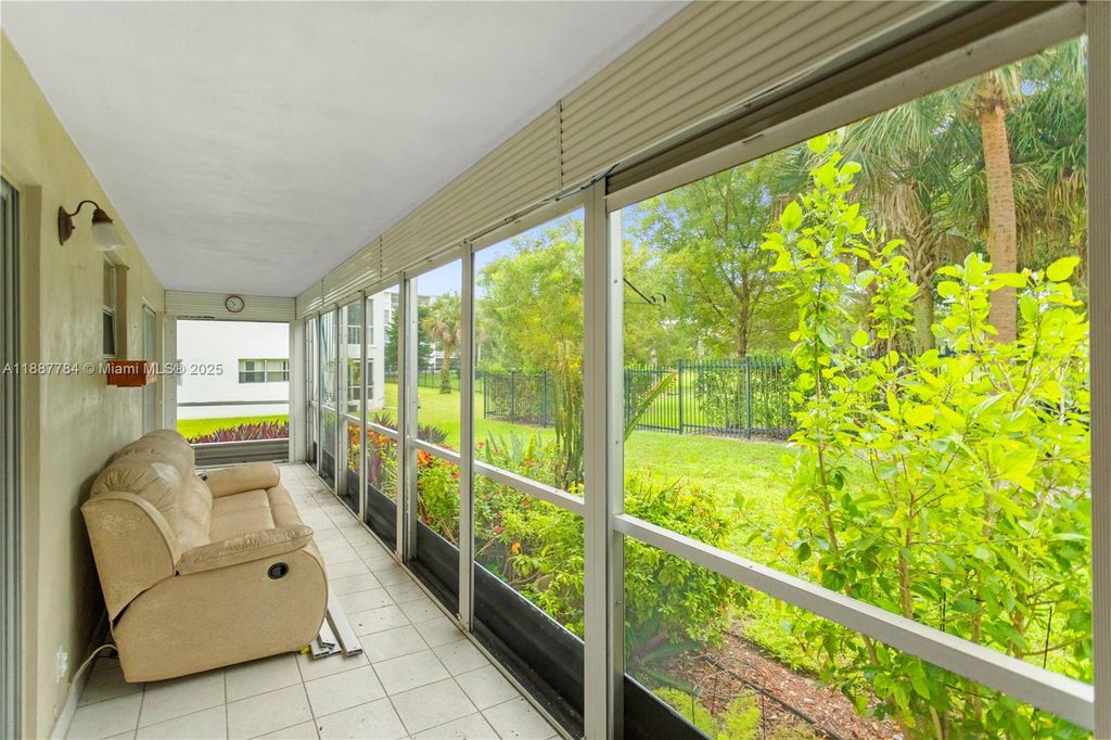 Photo of 4800 Hillcrest Ln #101, Hollywood, FL 33021 (MLS # A11887784)