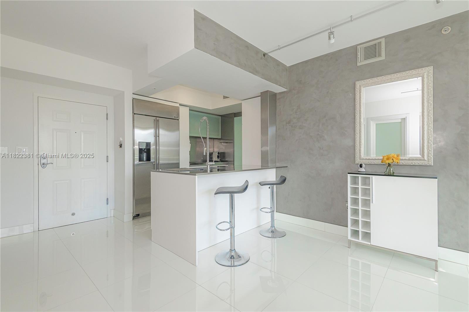 Stunningly remodeled & updated 2/2 residence w/bright porcelain floors elevates this rental property to a higher upscale level. Modern layout w/stainless steel appliances, XXL-size wall mounted TV, full size washer/dryer, spa-inspired totally remodeled bathrooms, custom build walk in closets, motorized blinds & Venetian-style plastered wall finishes meet the standards of Modern Times. Enjoy City living mixed w/the convenience of Bay front Margaret Pace, just minutes from Downtown, Miami Beach, Wynwood & Design District, Airport, Midtown shopping center & a short walk to supermarkets. CITE offers 24/7 security, valet, front desk lobby, TechnoGym, resort style pool, club room, hot tub, EV charging station in the secured & gated garage w/bike storage. Fine retail on premises.