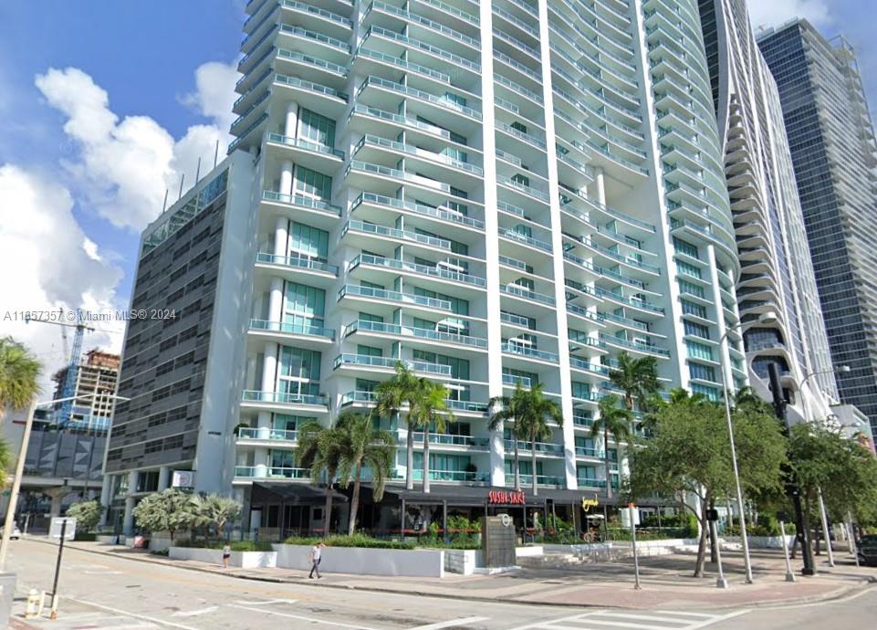 Gross lease. Elevate your business with this turn-key office suite on the 14th floor of the 900 Biscayne Bay Building. Spanning 1,910 sqft, this exceptional workspace is situated directly across from the Kaseya Center, offering incredible breathtaking 180-degree views of Biscayne Bay and Downtown Miami. The office layout includes 4 private offices, a spacious reception area, a versatile conference room/storage room, a dedicated lunchroom, and an ample enclosed closet space. Ideal for businesses seeking an upscale, fully equipped office in a great Miami location. Monthly Valet parking spaces for up to 3 vehicles based on availability.
