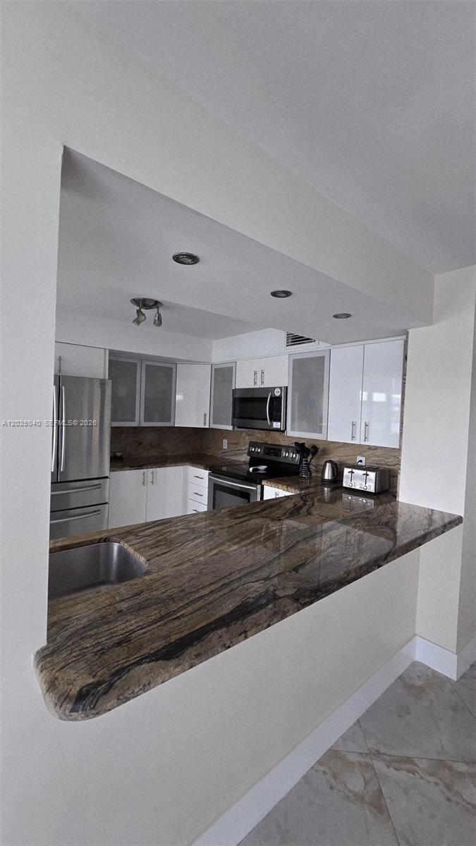 REEF EAST CONDO - Residential