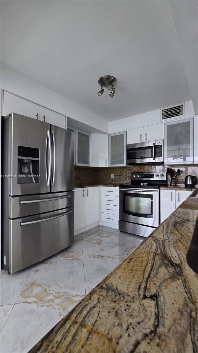REEF EAST CONDO - Residential