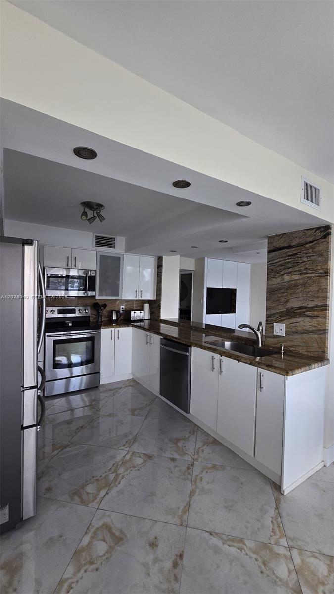REEF EAST CONDO - Residential