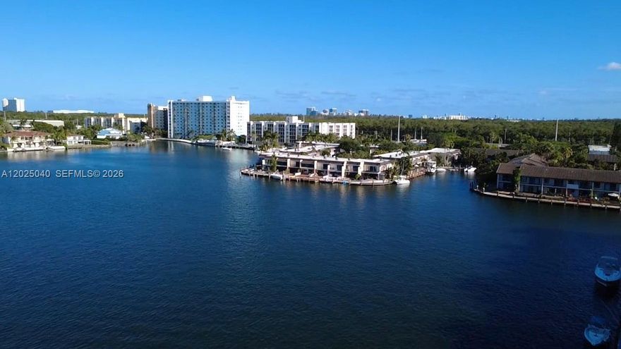 Stunning water views near Aventura! This totally updated condo in Reef Club East offers gorgeous views of Maule Lake and the skyline of Sunny Isles. Reef Club offers marina, 24 Hour gated security, tennis court, BBQ, gym and large pool. The apartment is a 1 Bed 1.5 bath that has been entirely remodeled. Porcelain floors, granite kitchen counters, and stainless steel appliances. Dock available for rent at low prices.